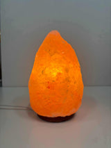 Himalaya zoutlamp roze 2-3 kg met warme amberkleurige gloed en houten voet